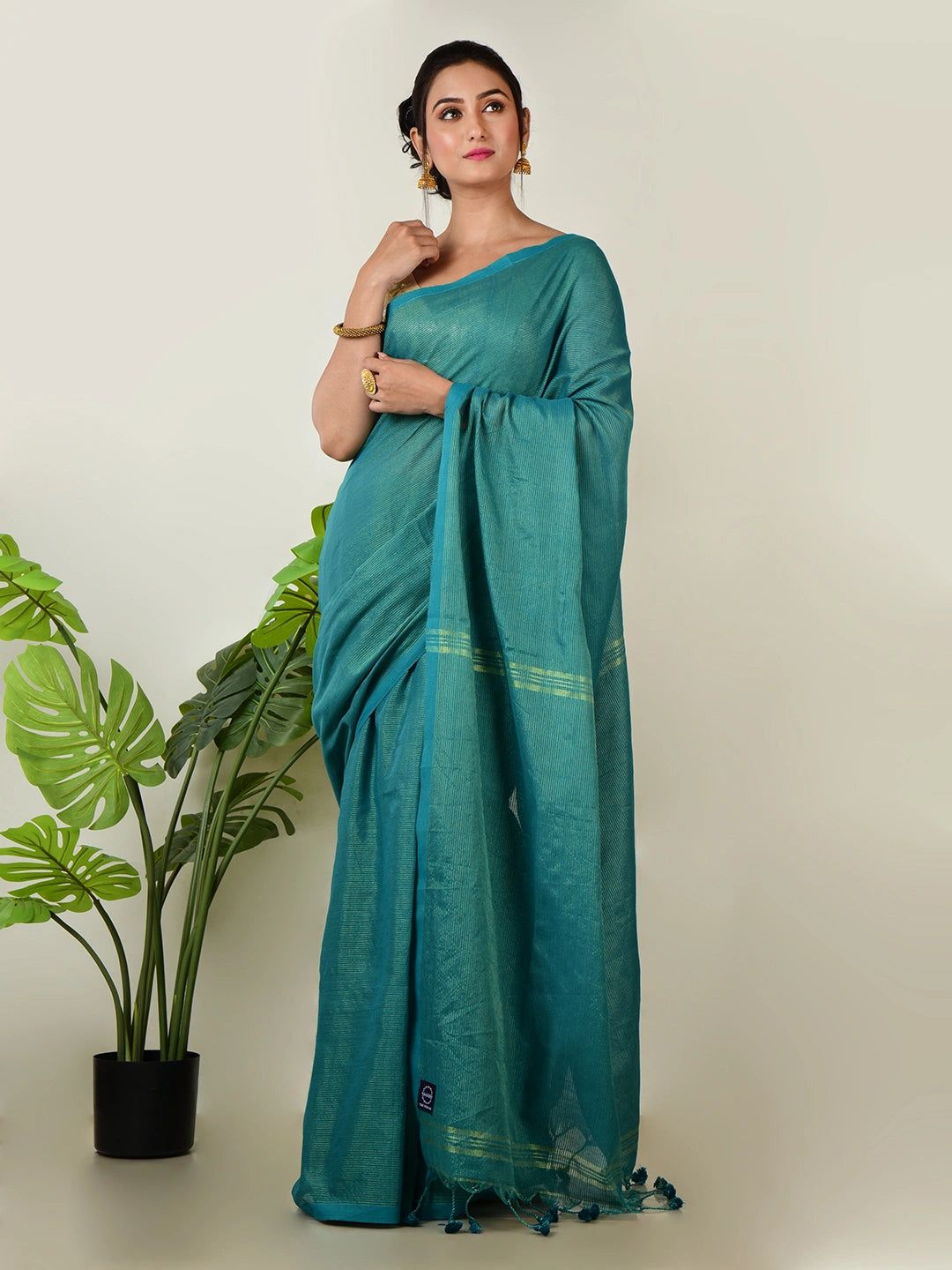 Mystic Lagoon | Turquoise Green Handloom Linen Saree With Golden Zari Stripe image 3