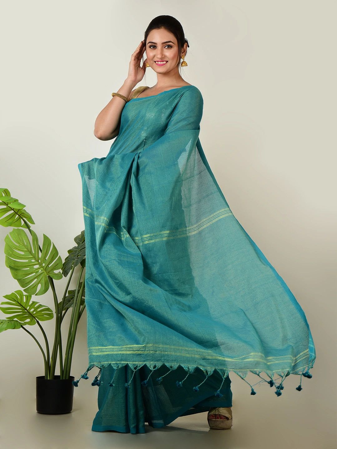 Mystic Lagoon | Turquoise Green Handloom Linen Saree With Golden Zari Stripe image 5