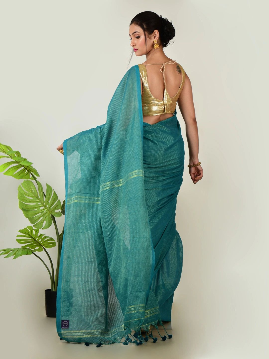 Mystic Lagoon | Turquoise Green Handloom Linen Saree With Golden Zari Stripe image 6