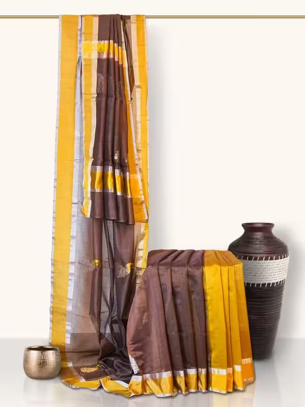 The Gold Weave Permium Chanderi Silk Saree - Brown Colour And Golden Border With Peacock Print.